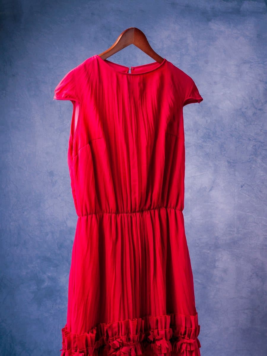 The uploaded garment photo: red dress